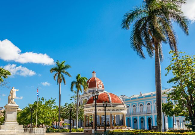 Cienfuegos Jose Marti central park with palms and historical buildings, Cienfuegos Province, Cuba
